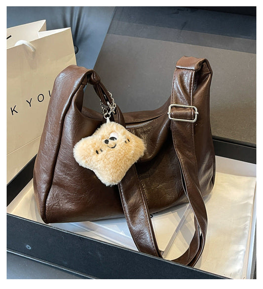 2025 new retro versatile shoulder messenger bag texture simple women's dumpling bag