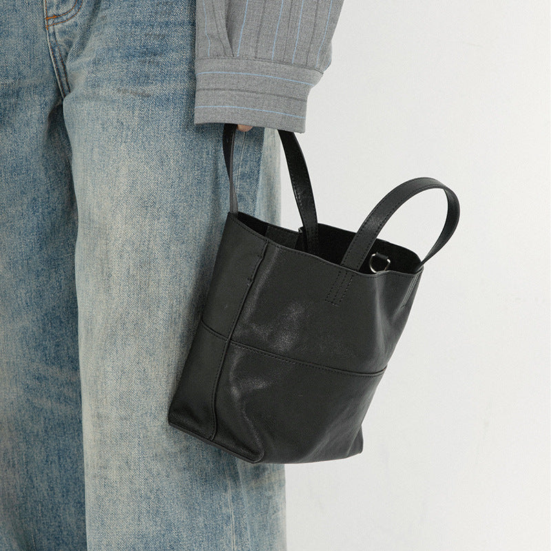Bucket bag for women 2025 new crossbody niche design top layer vegetable tanned cowhide shoulder handbag