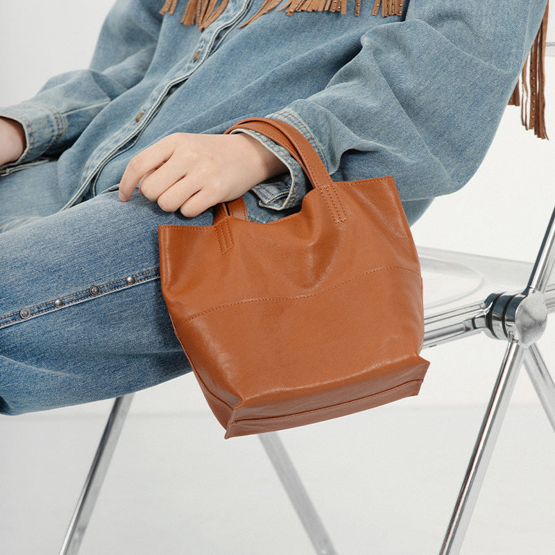 Bucket bag for women 2025 new crossbody niche design top layer vegetable tanned cowhide shoulder handbag