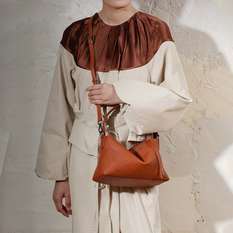 Women's handbags, shoulder-to-shoulder, crossbody, high-end, niche design, hand-held, genuine cowhide, armpit dumpling bag, new autumn and winter models