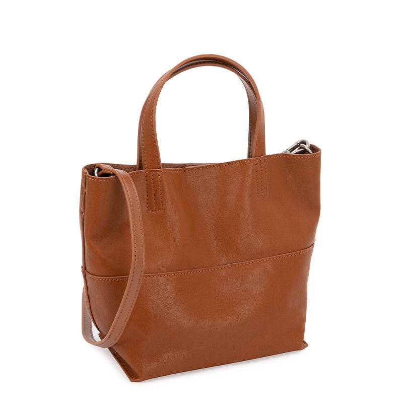 Bucket bag for women 2025 new crossbody niche design top layer vegetable tanned cowhide shoulder handbag