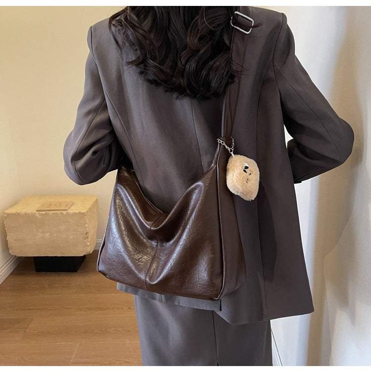 2025 new retro versatile shoulder messenger bag texture simple women's dumpling bag